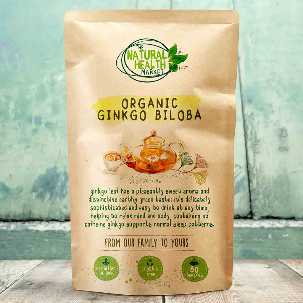 Bag of Organic Ginkgo Biloba from The Natural Health Market on a wooden surface with a blurred background.