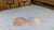 Two heaps of Himalayan pink rock salt side by side – coarse and fine grain, showcasing natural mineral-rich salt variations.