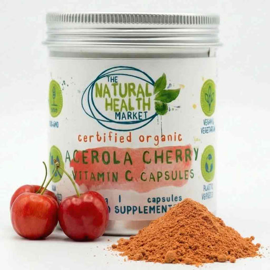 Supplement container labeled 'The Natural Health Market' with Acerola Cherry Vitamin C capsules, surrounded by cherries and Acerola cherry powder.