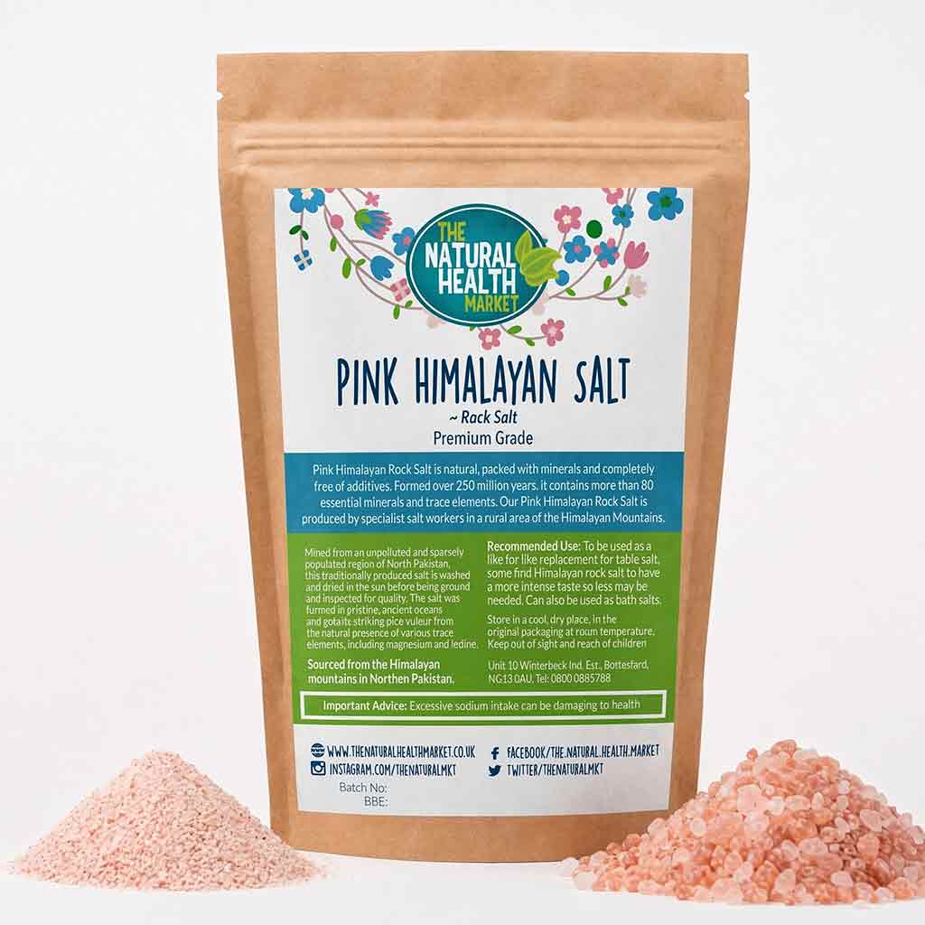 Himalayan Pink salt by the natural health market on a white background with both coarse and fine salt on show.